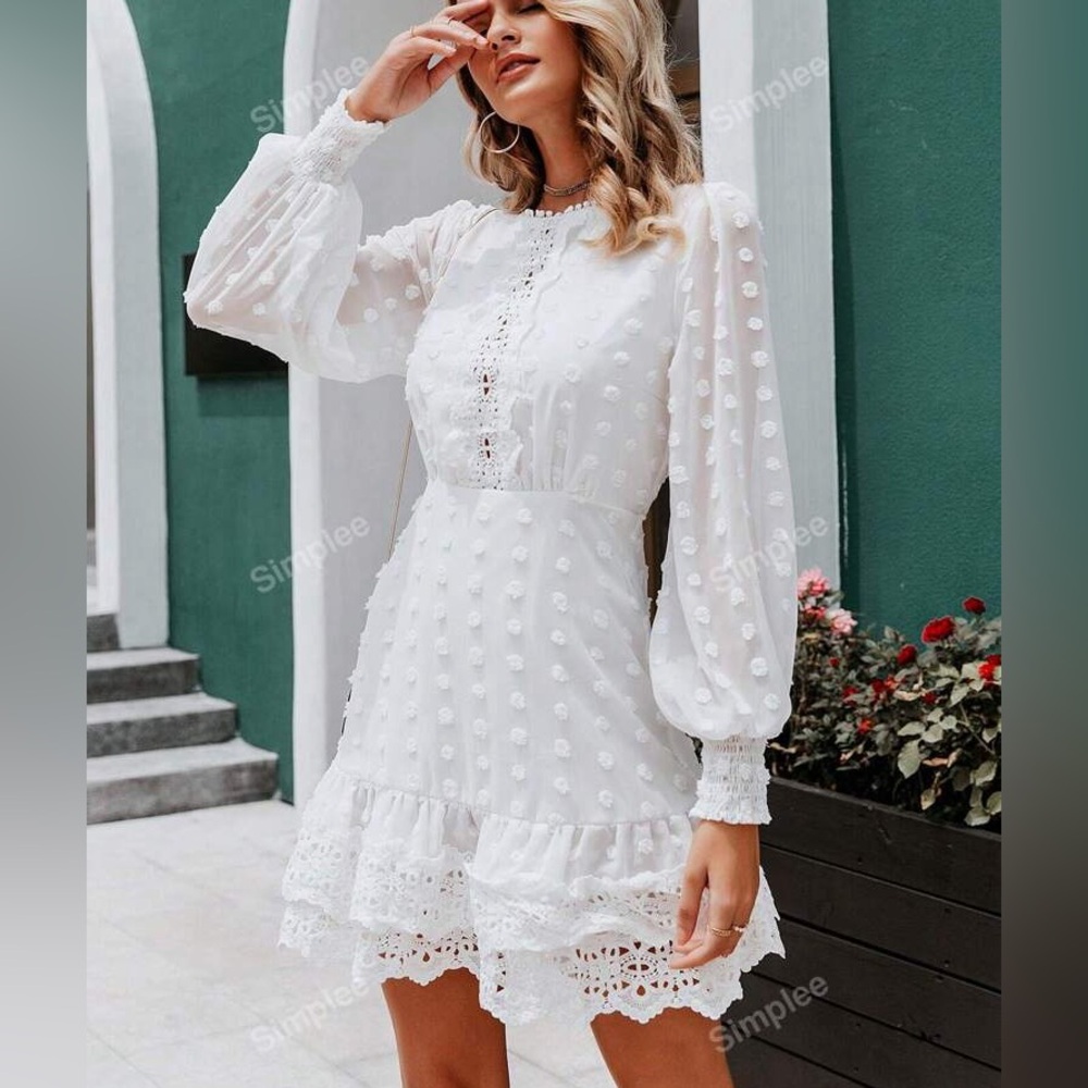 White Swiss Dot Mini Dress. Long sleeves